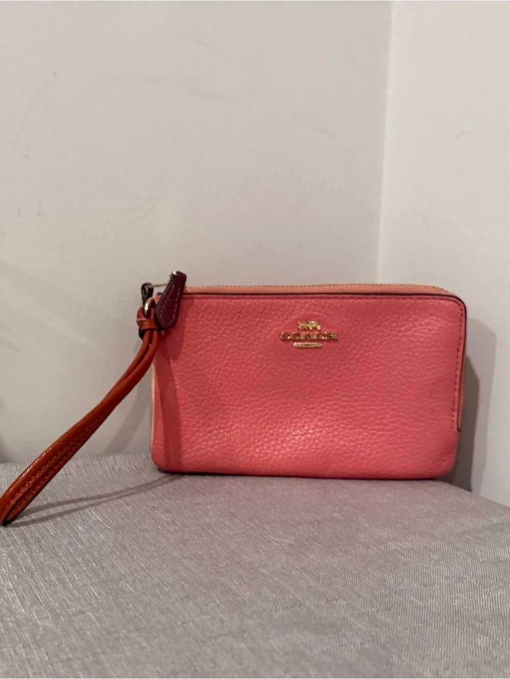 Coach Pink and Peach Two Tone Pebbled Leather Wristlet with Tan Strap
